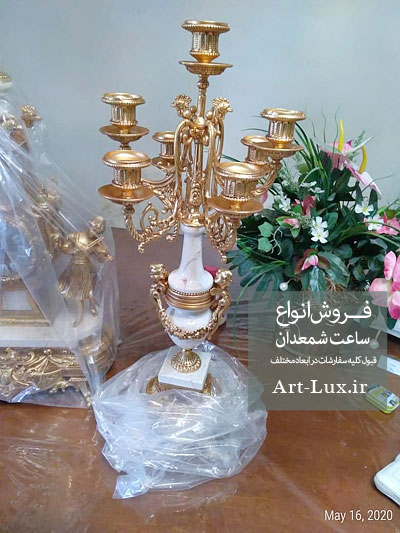 خرید ساعت و شمعدان برنز